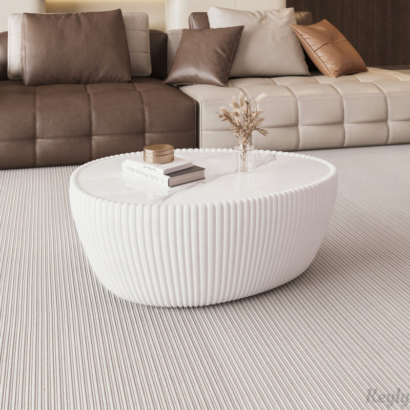 Table de canapé moderne en polyuréthane fritté clair en forme d'œuf en pierre blanche pour meubles de salon (chaque plateau de table possède un motif unique)