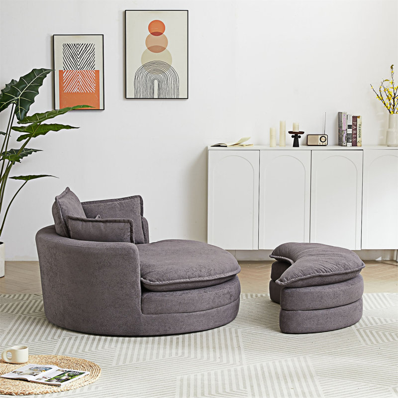 Grand fauteuil club rond moderne avec repose-pieds