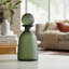 Glass Vase with Vertical Ribbed Detailing and Round Stopper Accent Aligned to Coastal Trend for Modern Decorative Display in Contemporary Interior Settings.-22520068-8510864