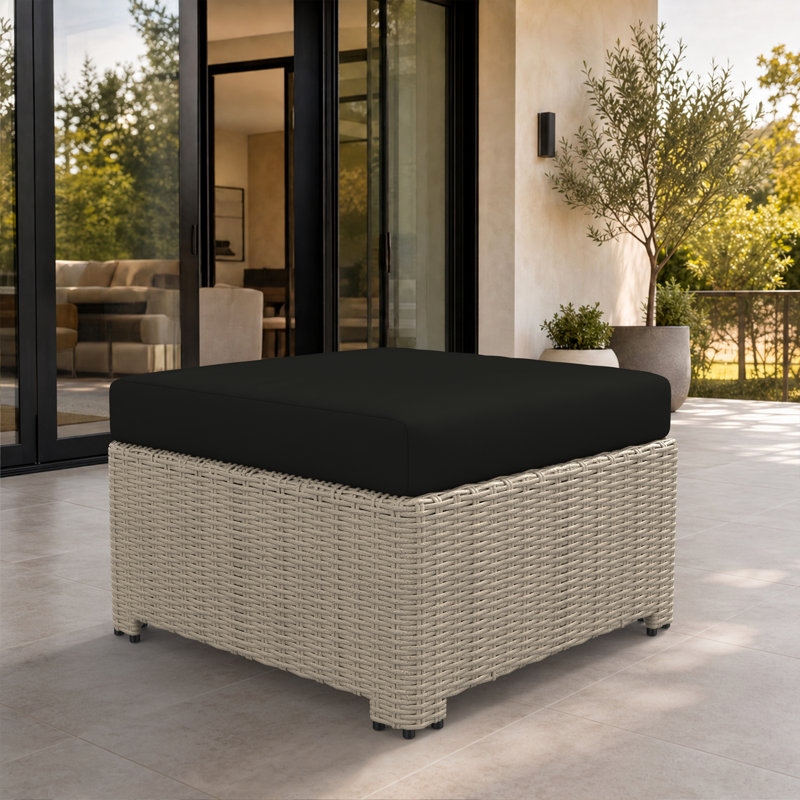 Pouf d'extérieur Henri en résine tressée résistante aux intempéries avec coussin Sunbrella, Sunbrella® toile noire