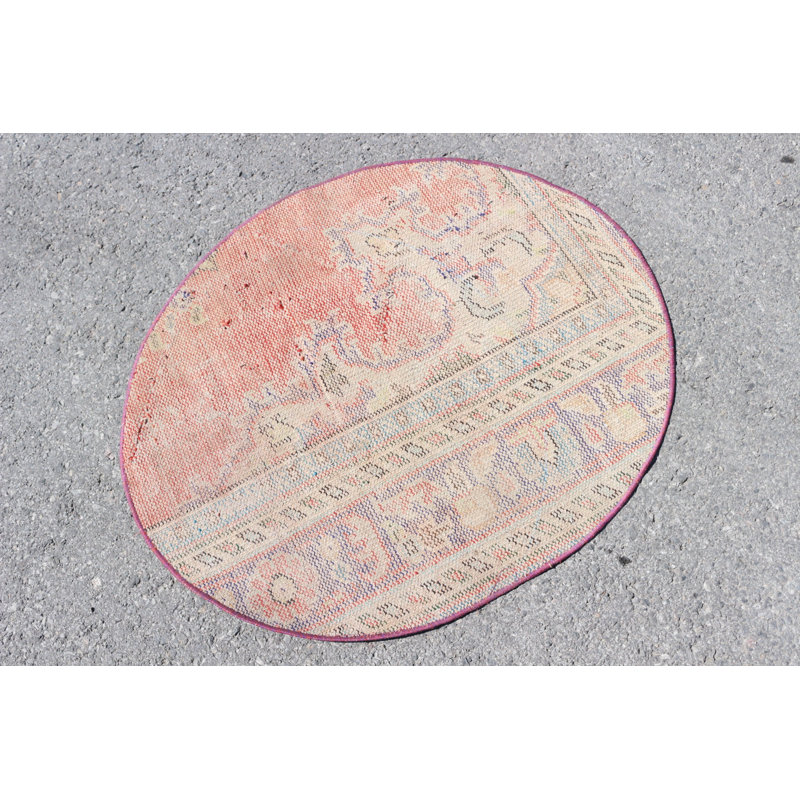 Small Vintage Turkish Rug in Round Shape Featuring Antique Design and Striking Orange Ideal for Organic Entryway Decor