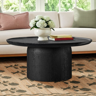 Table basse à piédestal en bois massif Ardo
