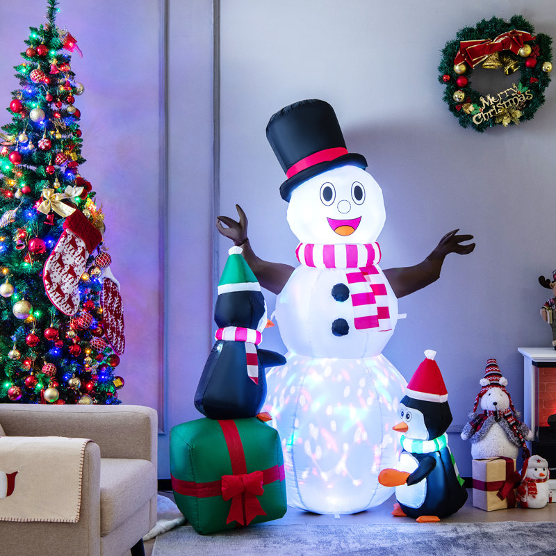 Bonhomme de neige gonflable de Noël et pingouins
