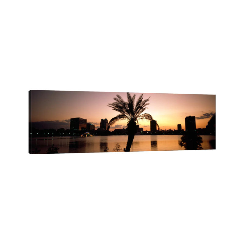 Silhouette Of Buildings At The Waterfront, Lake Eola, Summerlin Park, Orlando, Orange County, Florida, USA by Panoramic Images - Wrapped Canvas Panoramic Print