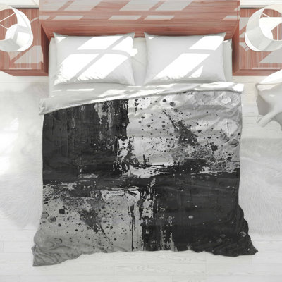 Édredon noir et blanc abstrait
