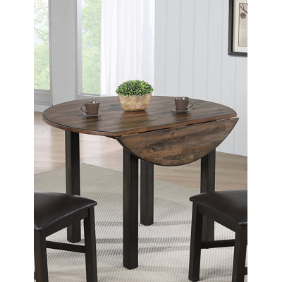 Mellor Extendable Round Solid Wood Dining Table