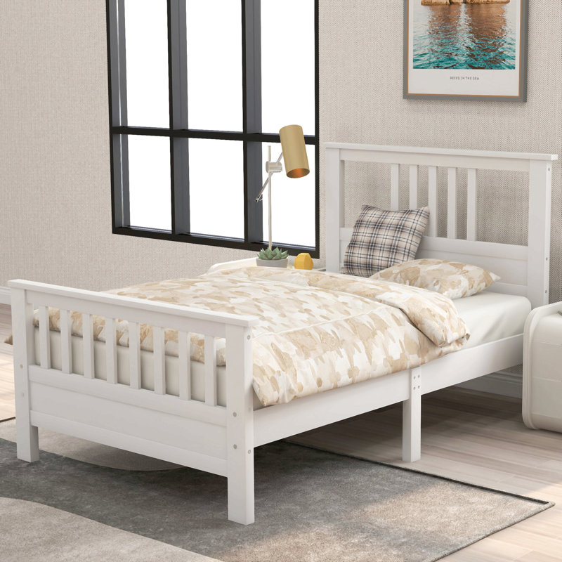 Lit plateforme en bois avec tête et pied de lit