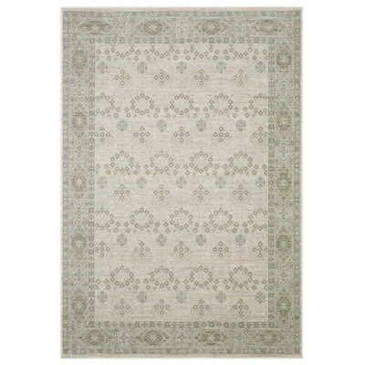 Tapis à motif floral beige et vert Kula