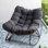 Chaise berçante avec coussin en rotin avec cadre en métal tissé