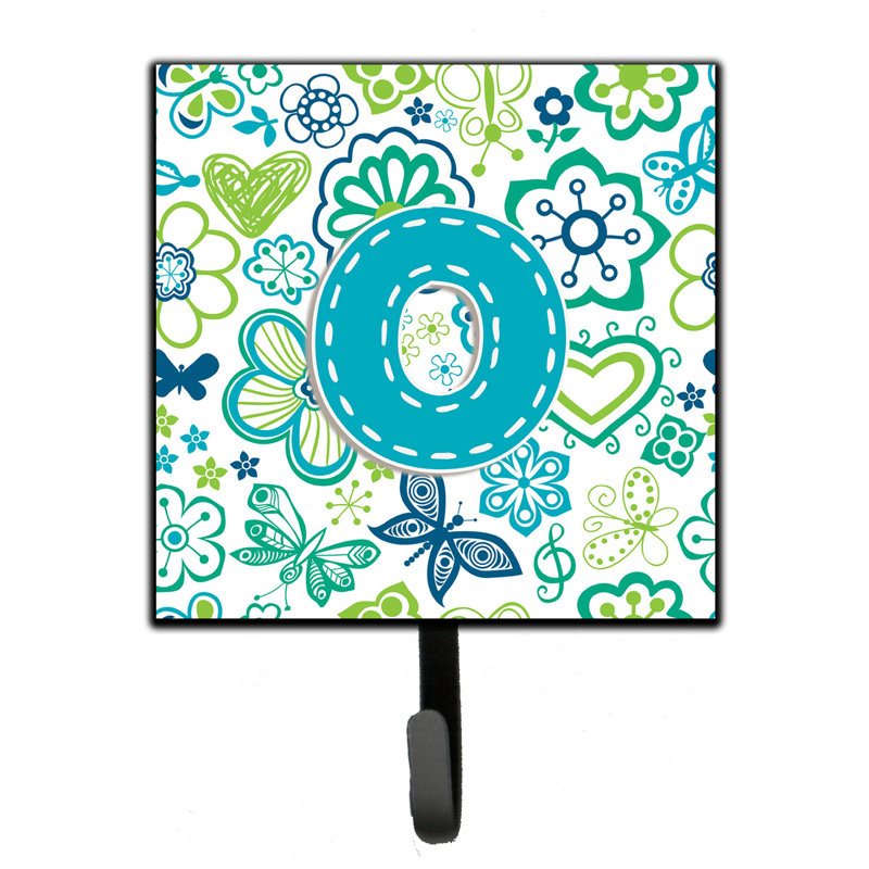 Crochet mural fleurs et papillons, O