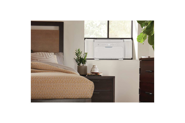 Bedroom window air conditioner unit.