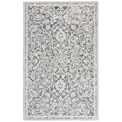 Laine touffetée à la main Juniper Tapis oriental en coton noir / ivoire