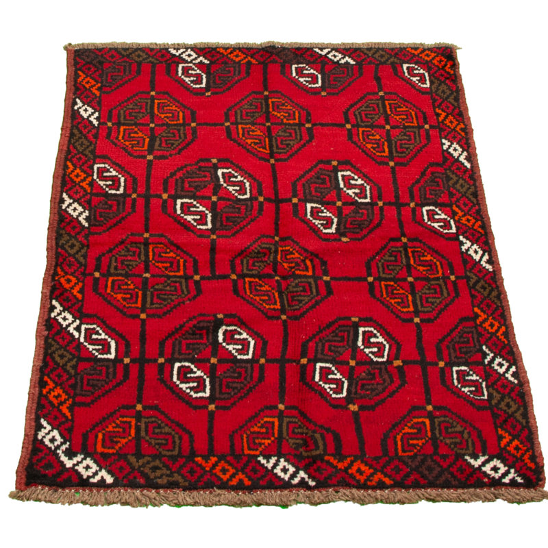 Tapis rouge en laine noué à la main
