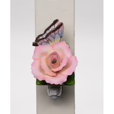 Papillon avec veilleuse paix rose