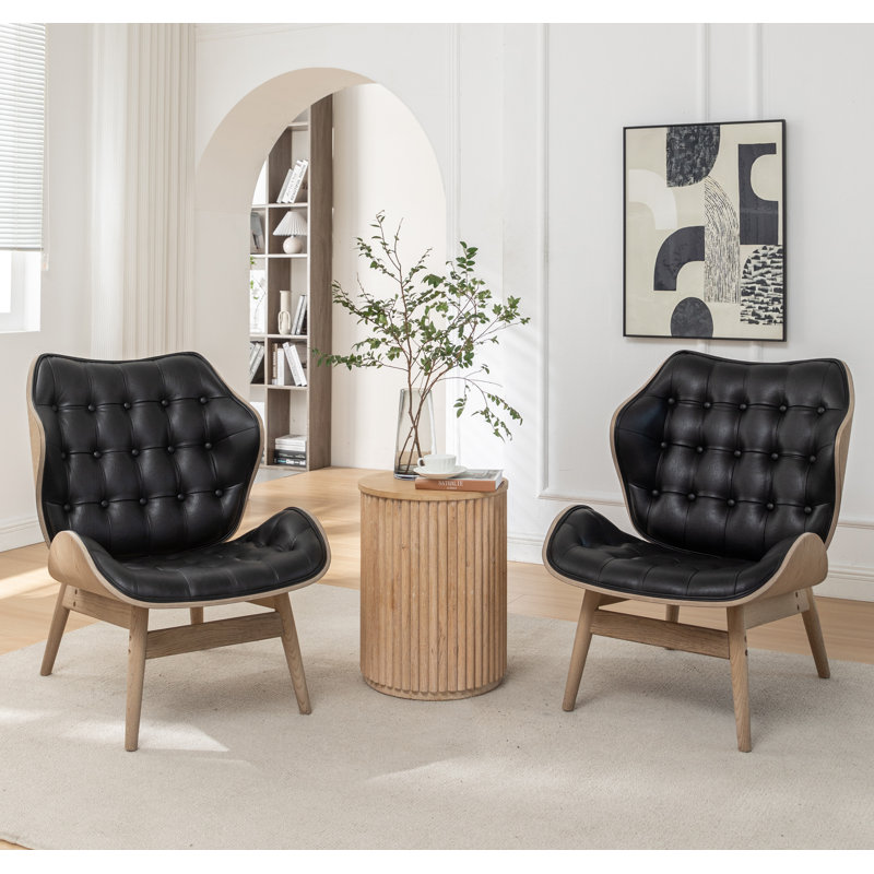 Fauteuil à oreilles capitonné Jeyshan, Similicuir noir