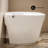 Swiss Madison Hugo Tankless Toilet 12" Rough-in 1.1 GPF Power Flush Toilet ADA Toilet with Integrated Tank and Manual Bidet in Glossy White Non Electric Toilet