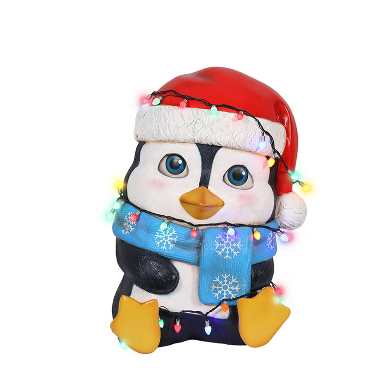 Bébé pingouin avec lumières