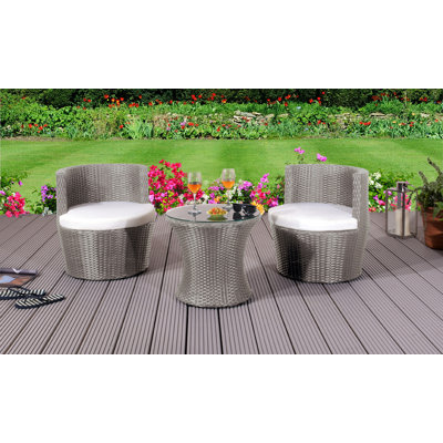 Dayana 2 - Person Wicker Patio Dining Set with Round Table , Cushions Included