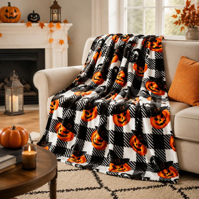 Jeté Halloween en molleton à carreaux