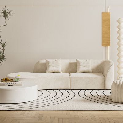 Canapé modulaire incurvé de 110 po avec accoudoir gauche, revêtu de tissu, pouvant être utilisé dans les salons et les appartements, dans le style blanc crème.