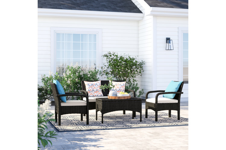 Berthony 4 Piece Rattan Sofa Seating Group with Cushions