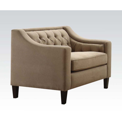Fauteuil capitonné l 34 po
