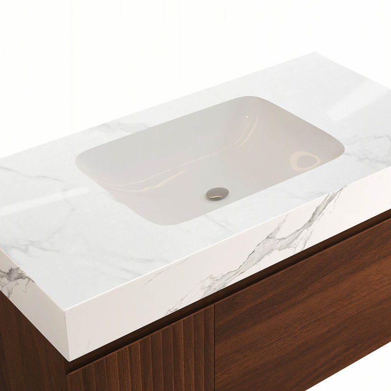 Meuble-lavabo suspendu de 91 cm (36 pouces) avec dessus en pierre frittée sans joint.