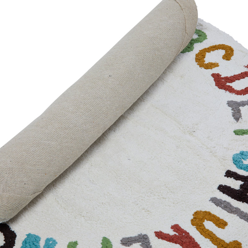 Tapis rond ivoire en coton touffeté Blissany
