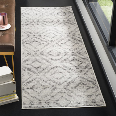 Holtz Geometric Area Rug
