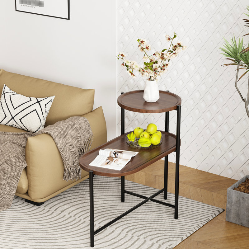 Table basse élégante avec plateau rond et base ovale, couleur noyer brun, 2 compartiments de rangement pour le salon