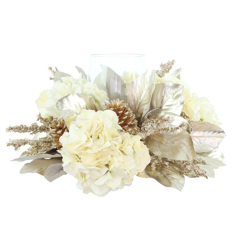 Bougeoir des Fêtes avec hortensias, feuilles de magnolia et pommes de pin scintillantes