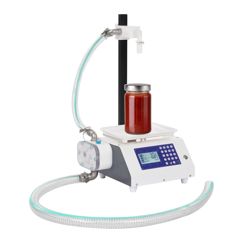 Machine de remplissage de bouteilles de miel