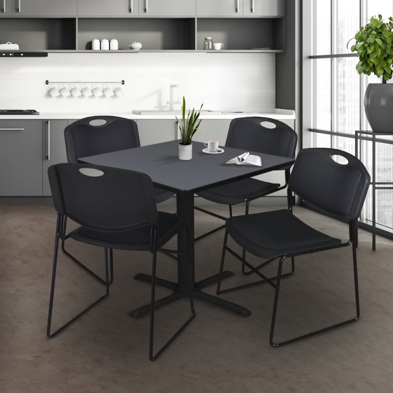 Black Metal Armless Stacking Chair with Padded Seat