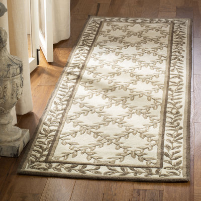 Taran Easy Care Hand Hooked Performance Floral Rug