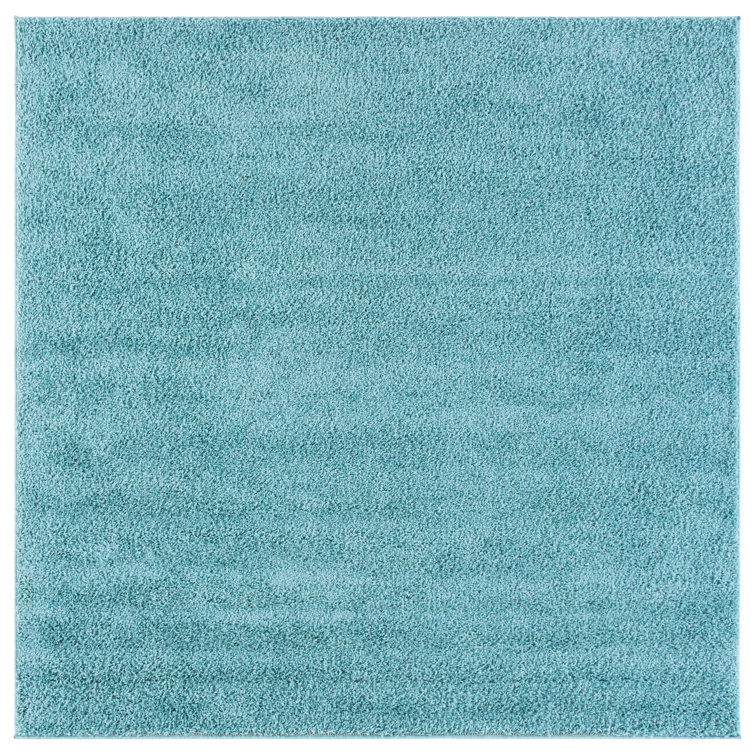 Helsel Shag Performance Machine Washable Solid Color Rug