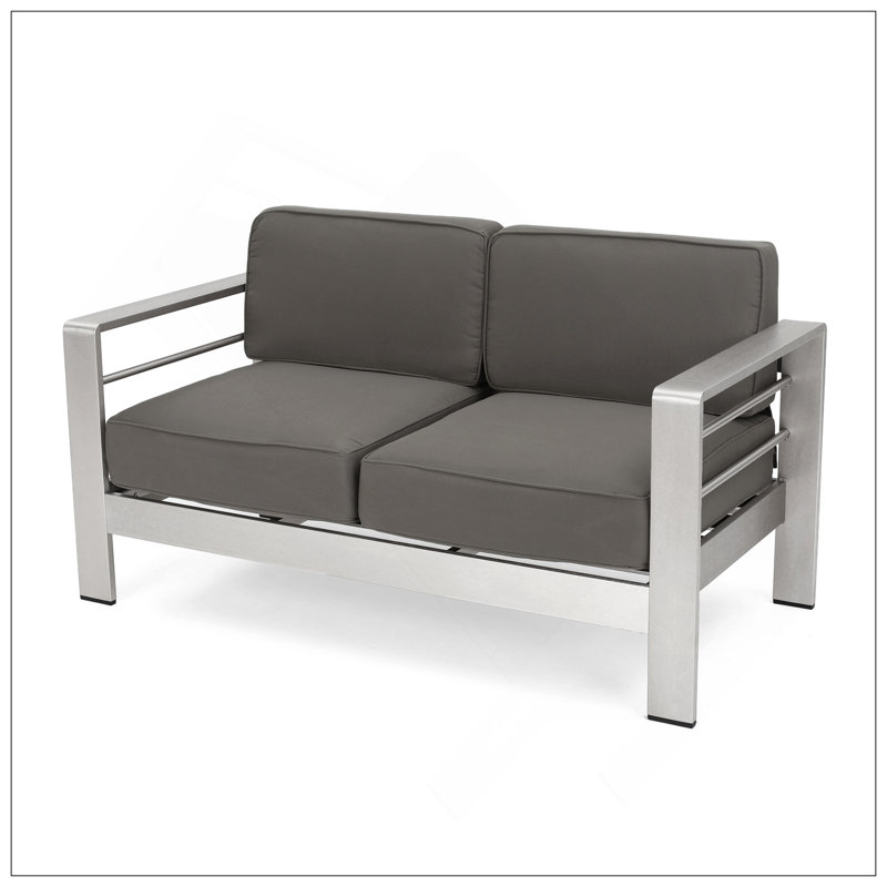 Causeuse Cape Coral KD avec structure en aluminium et coussins résistants à l'eau, parfaite pour la détente en plein air et la durabilité.