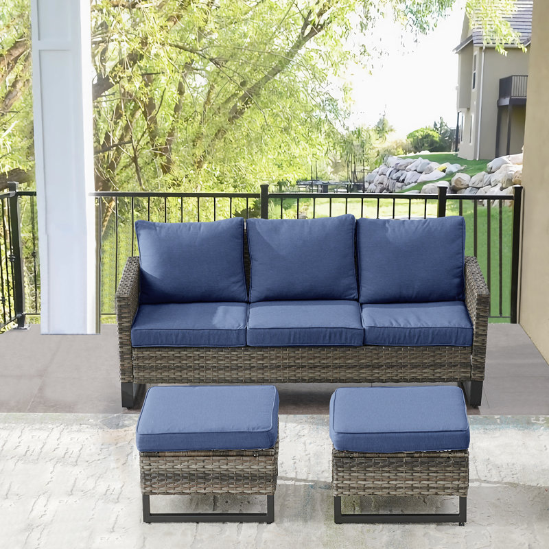 Canapé de patio extérieur en osier avec repose-pieds Ingvald, Bleu