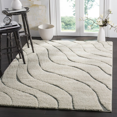 Ashal Abstract Cream Area Rug