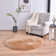 Round Lianet Solid Color Machine Woven Faux Sheepskin Area Rug in Beige