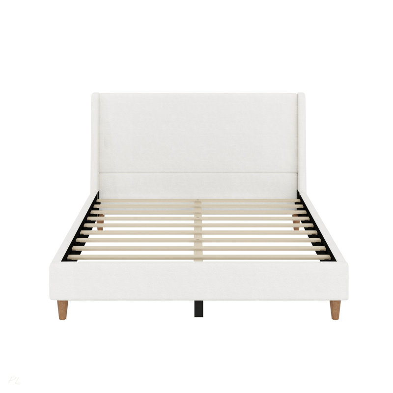 Lit plateforme tapissier blanc moderne avec tête de lit à oreilles et pieds en bois de noyer