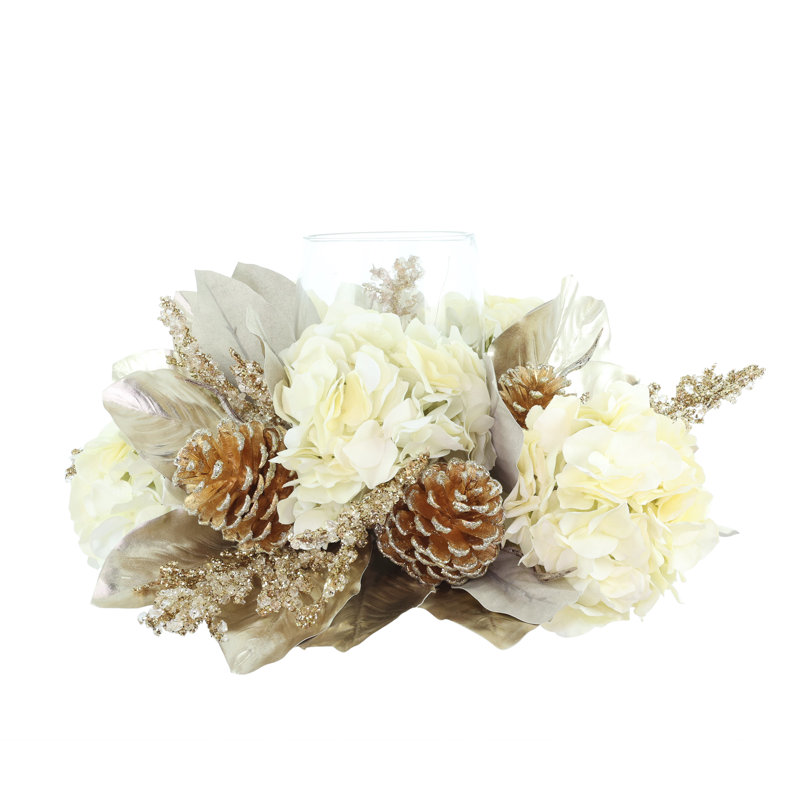 Bougeoir des Fêtes avec hortensias, feuilles de magnolia et pommes de pin scintillantes