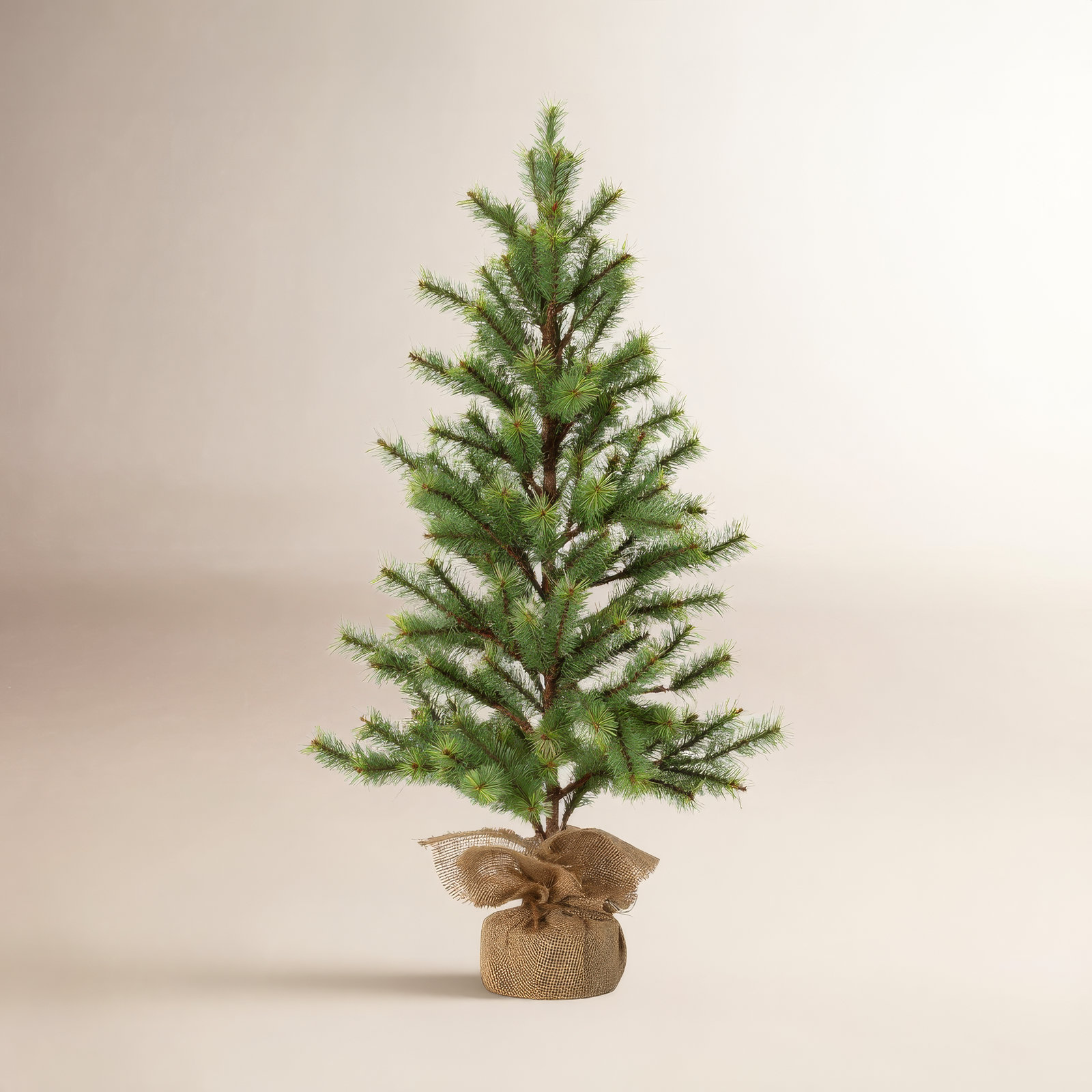 Shultz Faux Pine Tree in Wicker/Rattan Pot, 36.5" H x 17.5" W x 17.5" D
