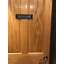 Plaque de porte de toilettes-313052920