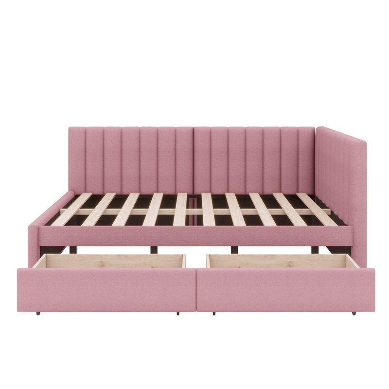 A Full-Sized Upholstered Daybed With Two Built-In Storage Drawers, Pink