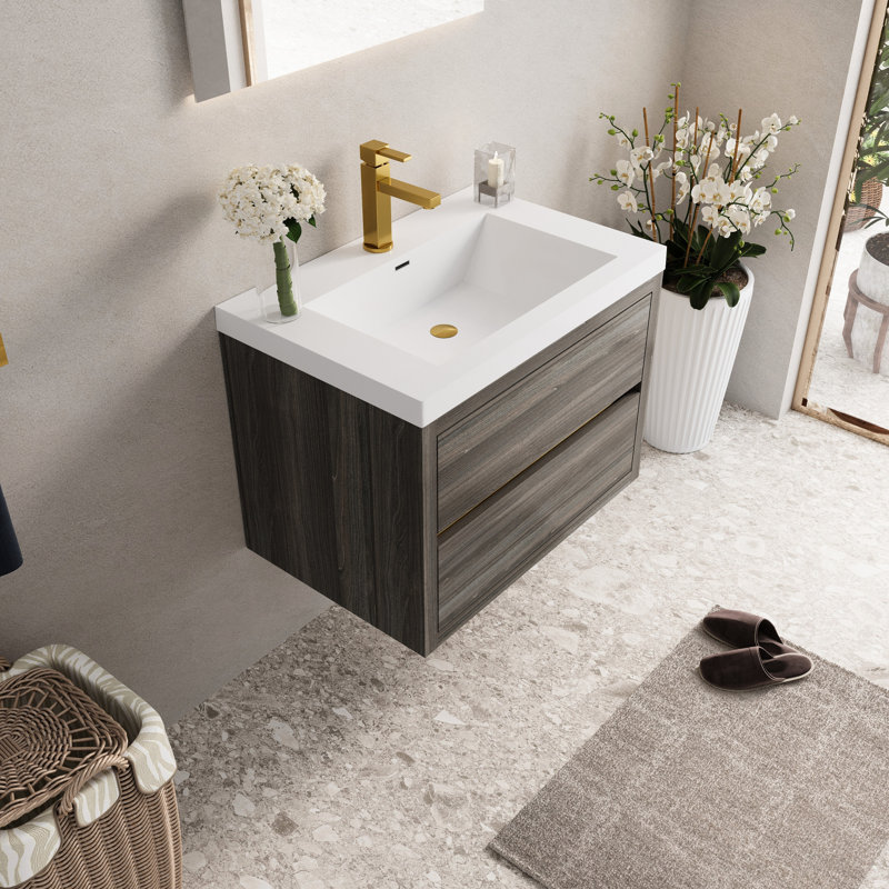 Meuble-lavabo de 30 po avec lavabo. Espace de rangement flottant gris cendré. Pré-assemblé pour plus de commodité. Organisation intérieure en forme de U. Comptoir en résine de pierre. Mécanisme de tiroir à fermeture silencieuse.