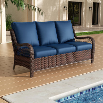 Fauteuil haut de gamme en rotin pour l'extérieur avec coussin pour trois personnes
