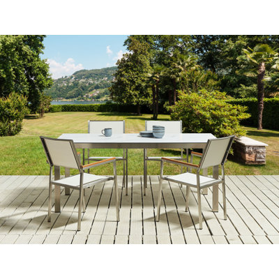Chenea 4 - Person Patio Dining Set with Rectangular Table