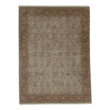 Hand Knotted Wool Area Rug in Ivory And Rust