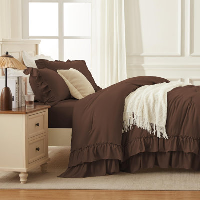 Comforter set in chocolate brown with a double ruffled edge design.