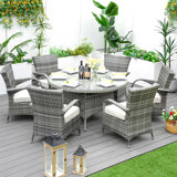 Round 6 - Person 53.14'' Long Dining Set With Cushions